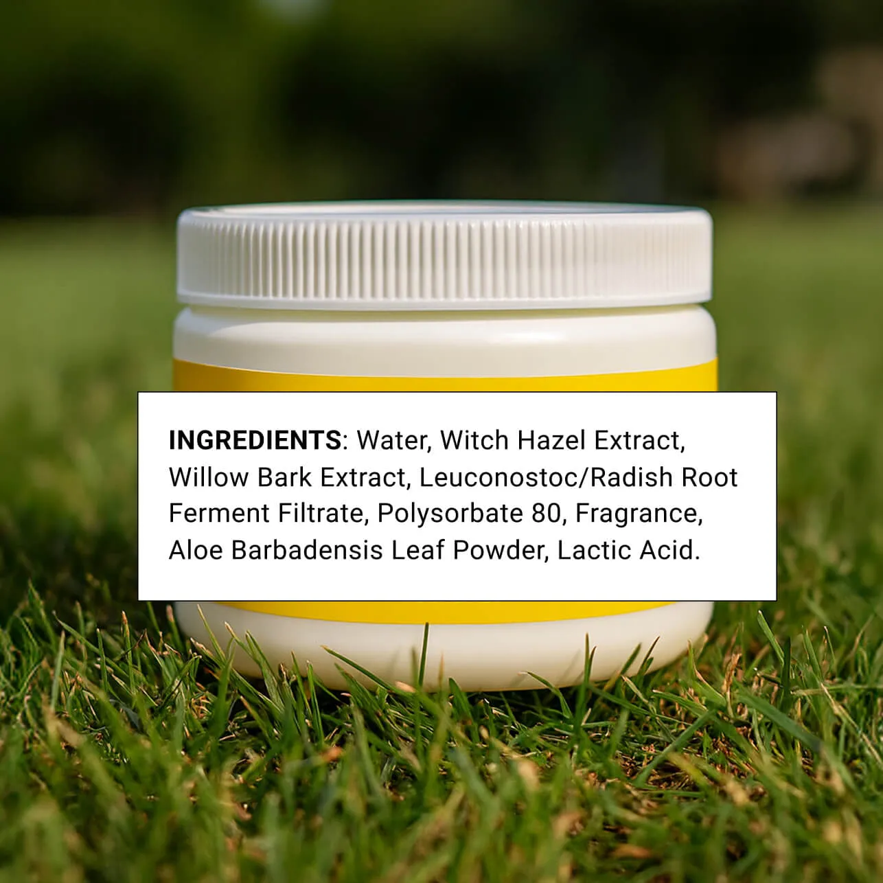Product container with ingredient list label displayed